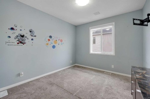 17 Yorkstone Way Sw, Calgary, AB - Indoor Photo Showing Other Room
