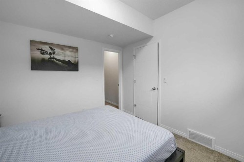 17 Yorkstone Way Sw, Calgary, AB - Indoor Photo Showing Bedroom