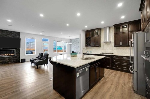 17 Yorkstone Way Sw, Calgary, AB - Indoor Photo Showing Kitchen With Double Sink With Upgraded Kitchen