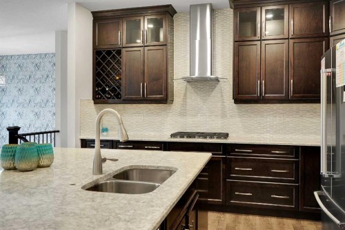 17 Yorkstone Way Sw, Calgary, AB - Indoor Photo Showing Kitchen With Double Sink With Upgraded Kitchen
