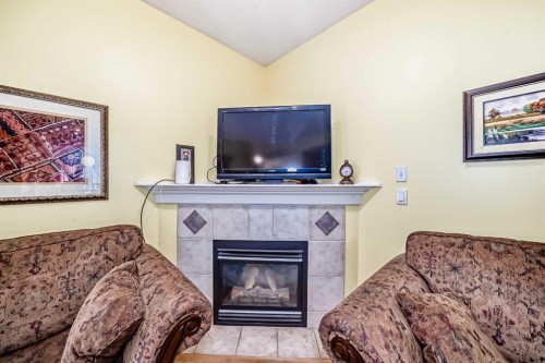 187 Bridlewood View Sw, Calgary, AB - Indoor With Fireplace