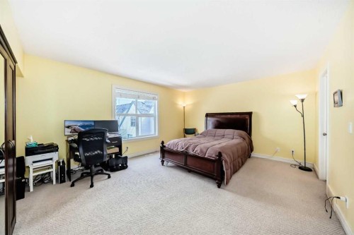 187 Bridlewood View Sw, Calgary, AB - Indoor Photo Showing Bedroom