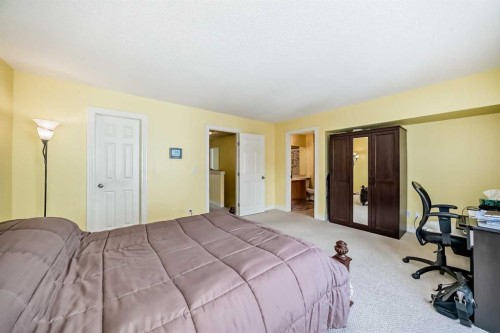 187 Bridlewood View Sw, Calgary, AB - Indoor Photo Showing Bedroom