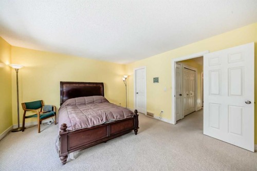 187 Bridlewood View Sw, Calgary, AB - Indoor Photo Showing Bedroom