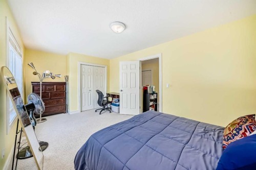 187 Bridlewood View Sw, Calgary, AB - Indoor Photo Showing Bedroom