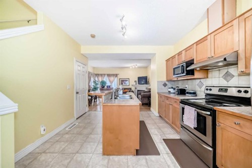 187 Bridlewood View Sw, Calgary, AB - Indoor Photo Showing Kitchen With Stainless Steel Kitchen With Double Sink