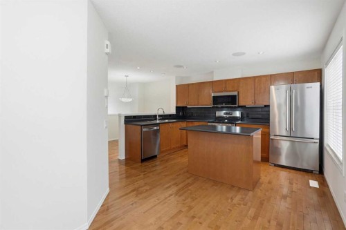 305 Elgin Gardens Se, Calgary, AB - Indoor Photo Showing Kitchen With Stainless Steel Kitchen