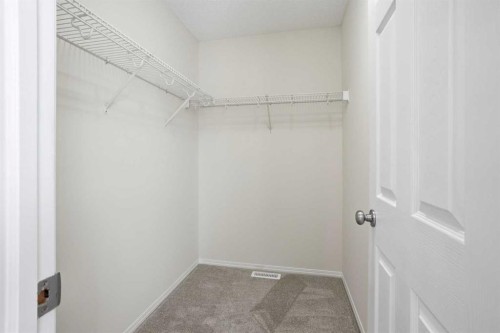 305 Elgin Gardens Se, Calgary, AB - Indoor With Storage