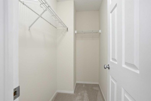 305 Elgin Gardens Se, Calgary, AB - Indoor With Storage