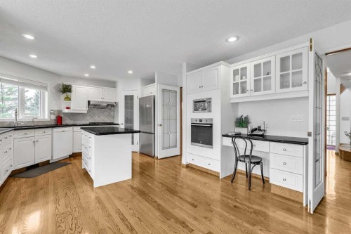 28 Woodpark Close Sw, Calgary, AB - Indoor Photo Showing Kitchen With Upgraded Kitchen
