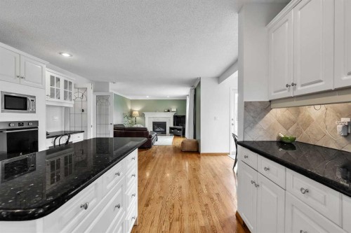 28 Woodpark Close Sw, Calgary, AB - Indoor Photo Showing Kitchen With Upgraded Kitchen