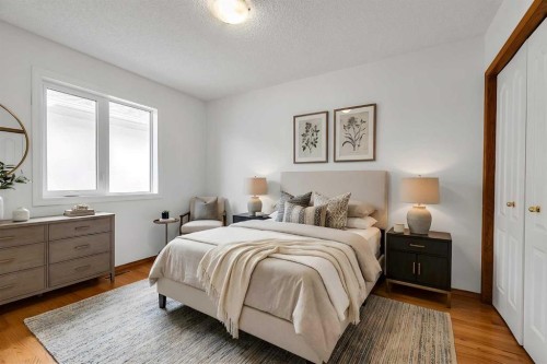 28 Woodpark Close Sw, Calgary, AB - Indoor Photo Showing Bedroom