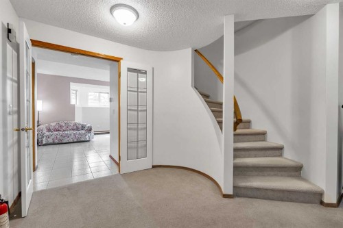 28 Woodpark Close Sw, Calgary, AB - Indoor Photo Showing Other Room