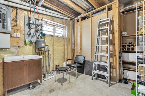 28 Woodpark Close Sw, Calgary, AB - Indoor Photo Showing Basement