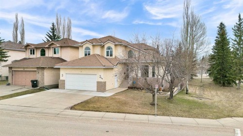 28 Woodpark Close Sw, Calgary, AB - Outdoor With Facade