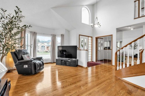 28 Woodpark Close Sw, Calgary, AB - Indoor Photo Showing Living Room