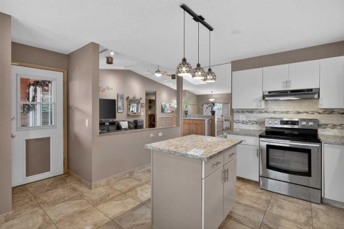 80 Deerbrook Road Se, Calgary, AB - Indoor Photo Showing Kitchen With Stainless Steel Kitchen