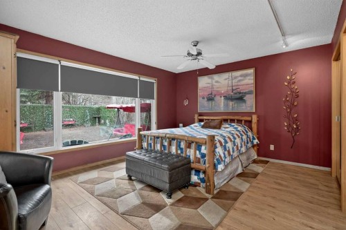 80 Deerbrook Road Se, Calgary, AB - Indoor Photo Showing Bedroom