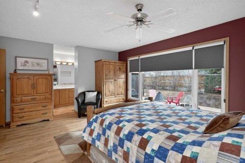 80 Deerbrook Road Se, Calgary, AB - Indoor Photo Showing Bedroom