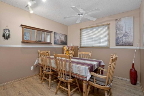 80 Deerbrook Road Se, Calgary, AB - Indoor Photo Showing Dining Room