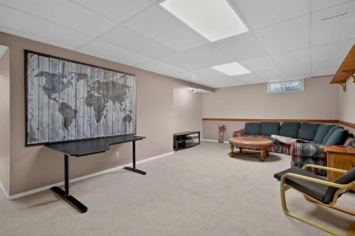 80 Deerbrook Road Se, Calgary, AB - Indoor Photo Showing Basement