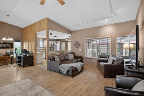80 Deerbrook Road Se, Calgary, AB - Indoor Photo Showing Living Room