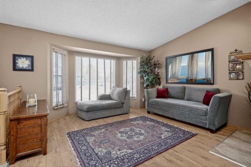 80 Deerbrook Road Se, Calgary, AB - Indoor Photo Showing Living Room