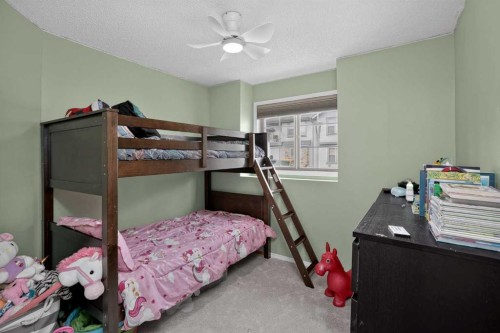 105-23 Everridge Square Sw, Calgary, AB - Indoor Photo Showing Bedroom