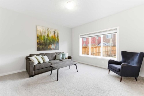 69 Legacy Manor Se, Calgary, AB - Indoor Photo Showing Living Room