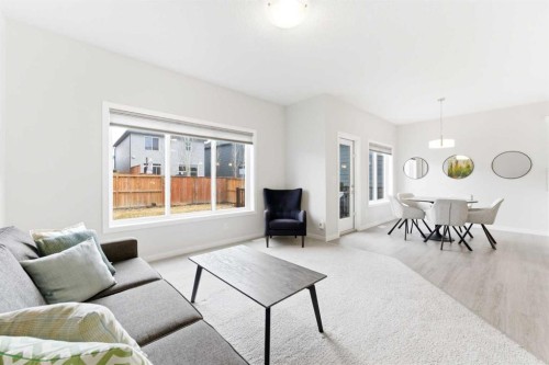69 Legacy Manor Se, Calgary, AB - Indoor Photo Showing Living Room