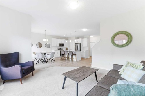 69 Legacy Manor Se, Calgary, AB - Indoor Photo Showing Living Room