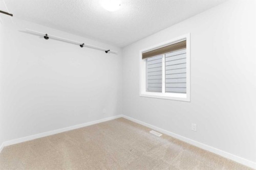 69 Legacy Manor Se, Calgary, AB - Indoor Photo Showing Other Room