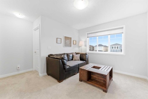 69 Legacy Manor Se, Calgary, AB - Indoor Photo Showing Living Room