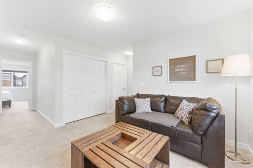 69 Legacy Manor Se, Calgary, AB - Indoor Photo Showing Living Room