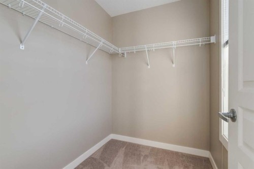 705 Evanston Square Nw, Calgary, AB - Indoor With Storage