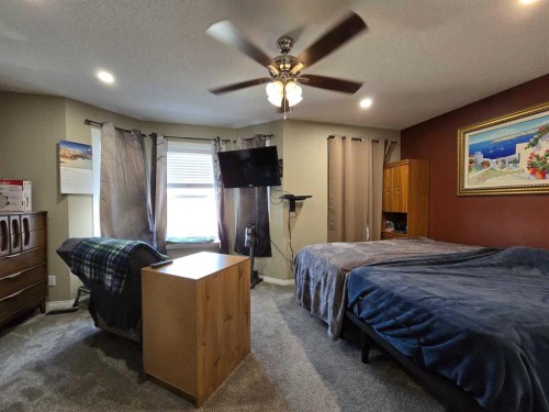 23 Prestwick Park Se, Calgary, AB - Indoor Photo Showing Bedroom
