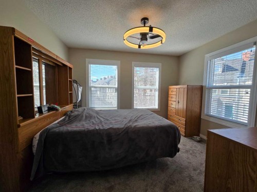 23 Prestwick Park Se, Calgary, AB - Indoor Photo Showing Bedroom