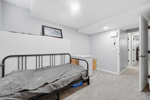 23 Prestwick Park Se, Calgary, AB - Indoor Photo Showing Bedroom