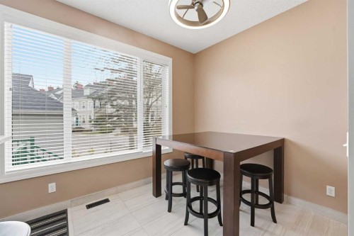 23 Prestwick Park Se, Calgary, AB - Indoor Photo Showing Dining Room