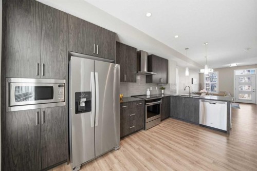 4135 Seton Drive Se, Calgary, AB - Indoor Photo Showing Kitchen With Stainless Steel Kitchen With Upgraded Kitchen
