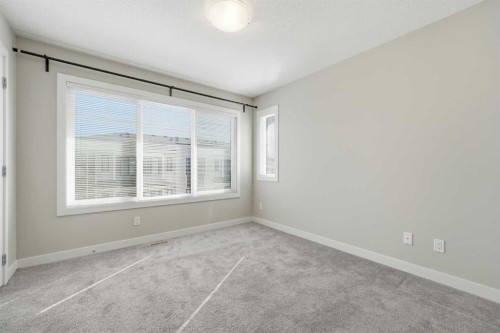 4135 Seton Drive Se, Calgary, AB - Indoor Photo Showing Other Room