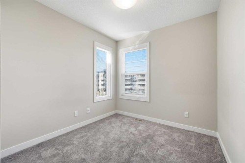 4135 Seton Drive Se, Calgary, AB - Indoor Photo Showing Other Room