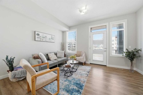 4135 Seton Drive Se, Calgary, AB - Indoor Photo Showing Living Room