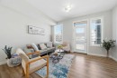 4135 Seton Drive Se, Calgary, AB  - Indoor Photo Showing Living Room 