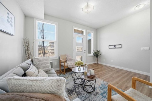 4135 Seton Drive Se, Calgary, AB - Indoor Photo Showing Living Room