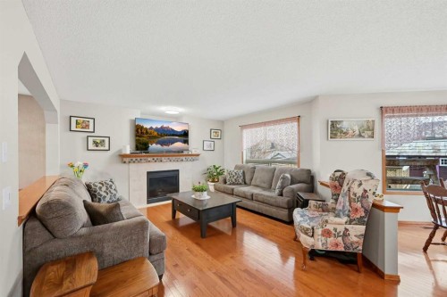 127 Kincora Heights Nw, Calgary, AB - Indoor Photo Showing Living Room With Fireplace