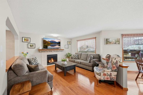 127 Kincora Heights Nw, Calgary, AB - Indoor Photo Showing Living Room With Fireplace