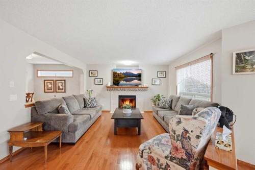 127 Kincora Heights Nw, Calgary, AB - Indoor Photo Showing Living Room With Fireplace