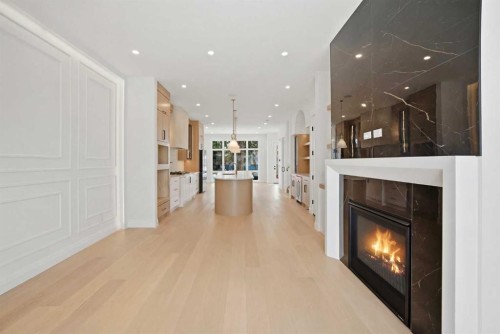 1529 18 Avenue Nw, Calgary, AB - Indoor Photo Showing Living Room With Fireplace