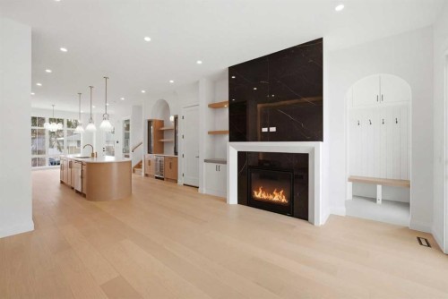 1529 18 Avenue Nw, Calgary, AB - Indoor Photo Showing Living Room With Fireplace